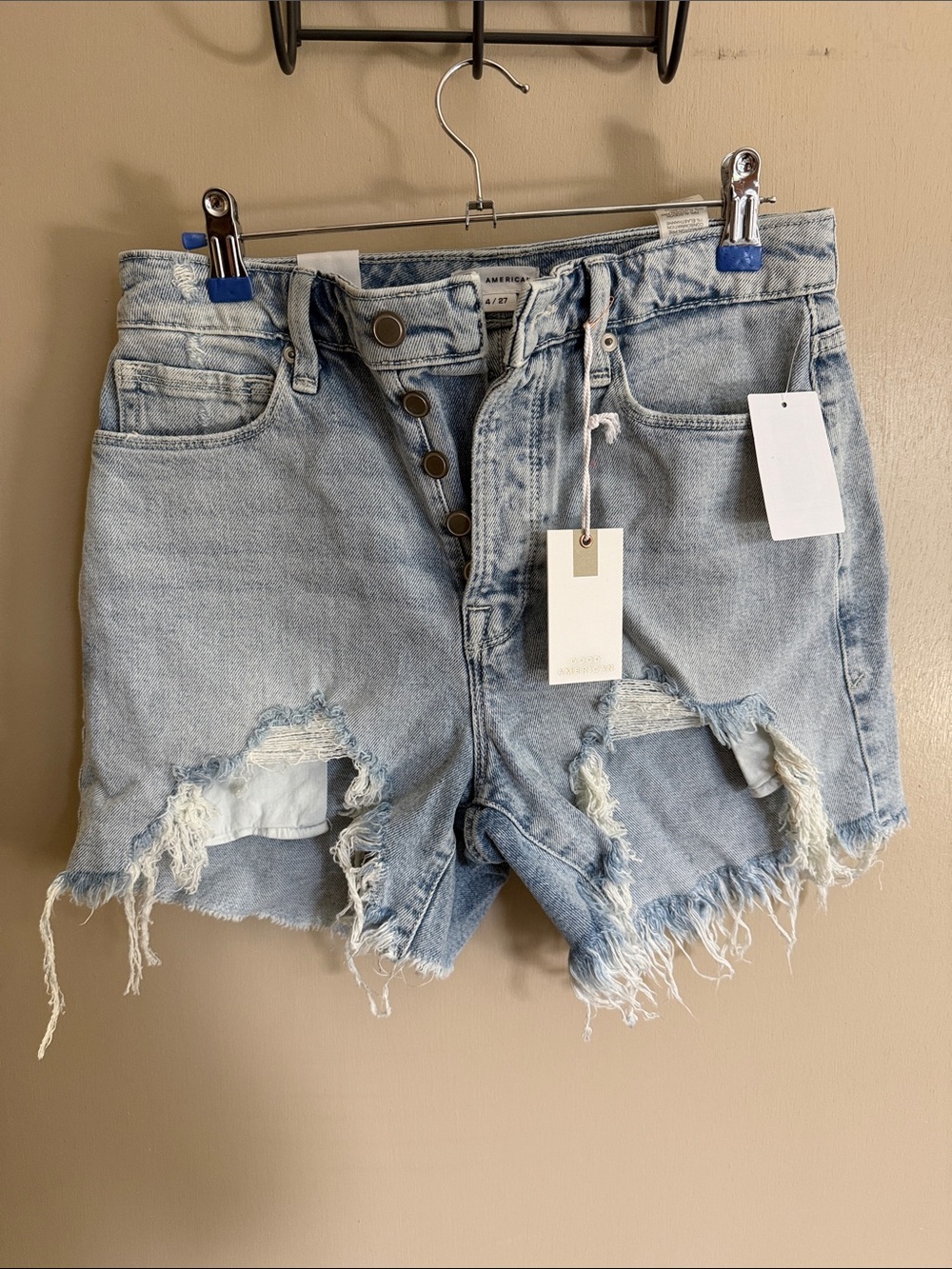 Good American Light Wash Distressed High-Rise Jean Shorts